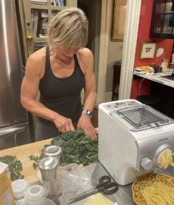 GUKM polli chopping greens with pasta maker