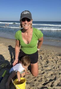 Polli on beach with Logan