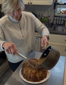 No baking awards, but delicious Jewish Apple Cake, and my boyfriend. Polli pouring glaze on apple cake