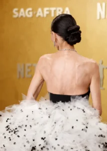 At the Oscars. Nobody wants to look like J. Lo or Kim anymore. demi moore poses red carpet 122580211