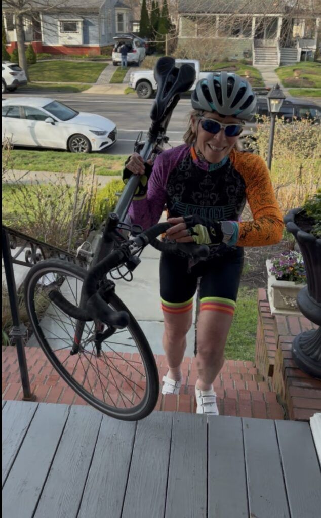 Polli carrying the bike